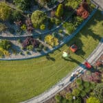 ce landscape aerial view of landscaper aerating clients lawn